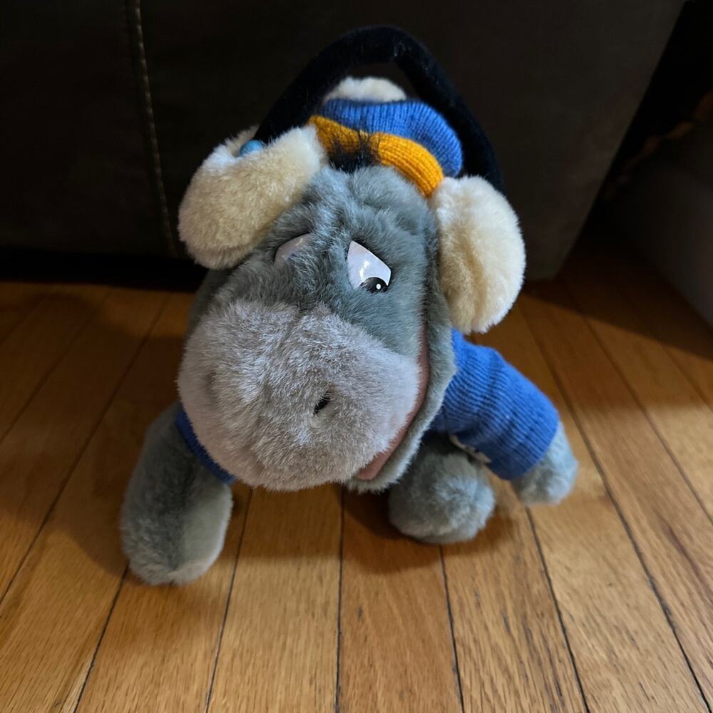 Walt Disney World Eeyore Plush Wearing A Sweater And Ear Muffs. 12"